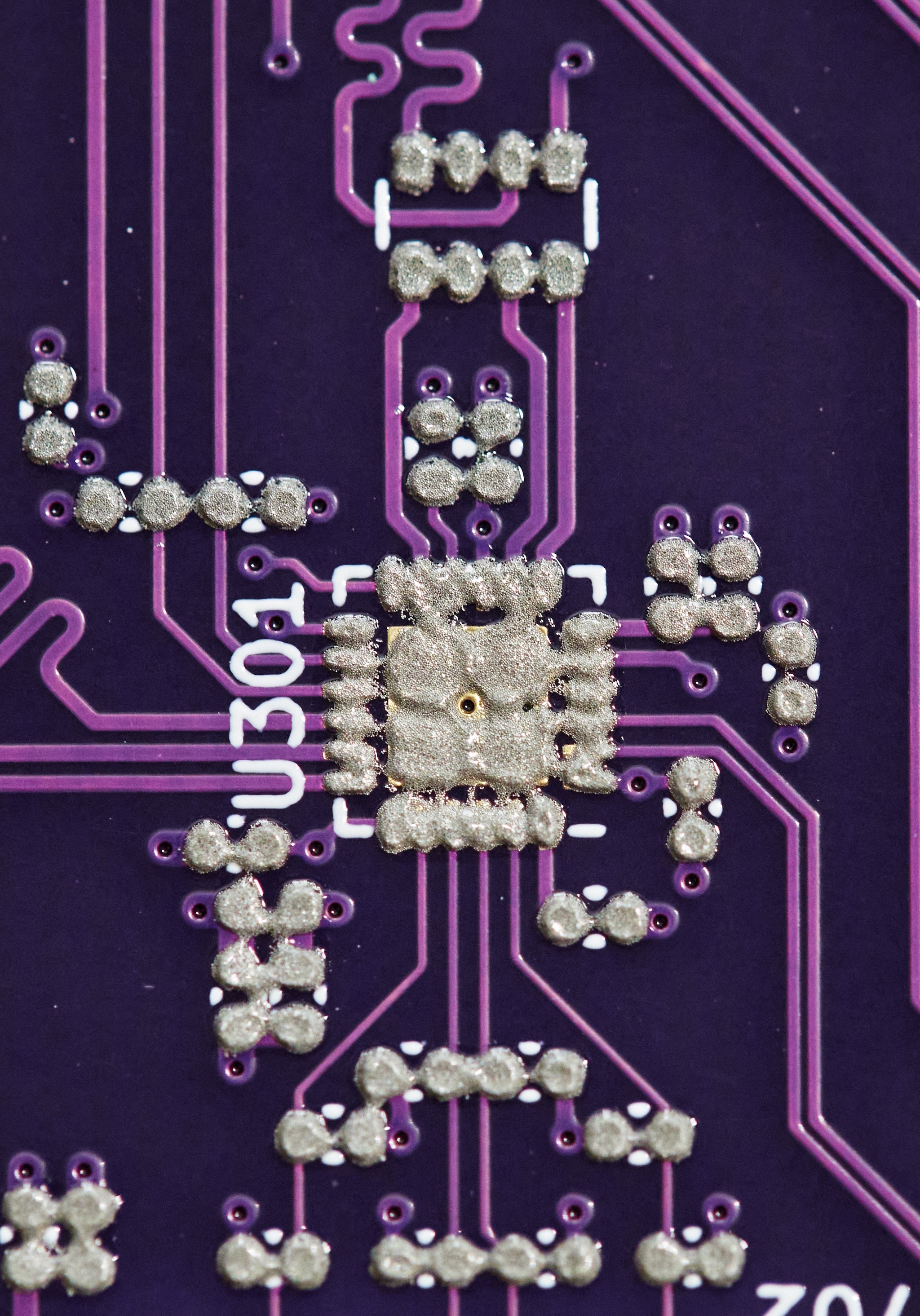 View of the Ethernet PHY area of the board with solder paste applied